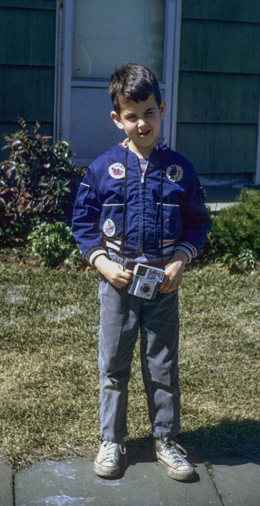 Andy in a baseball jacket